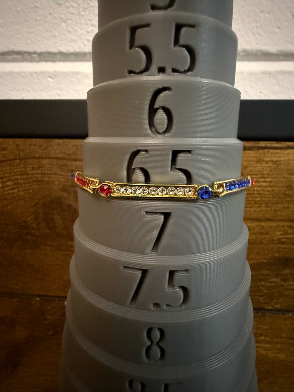 Gold-Tone Crystal Bangle Bracelet with Red & Blue Accents